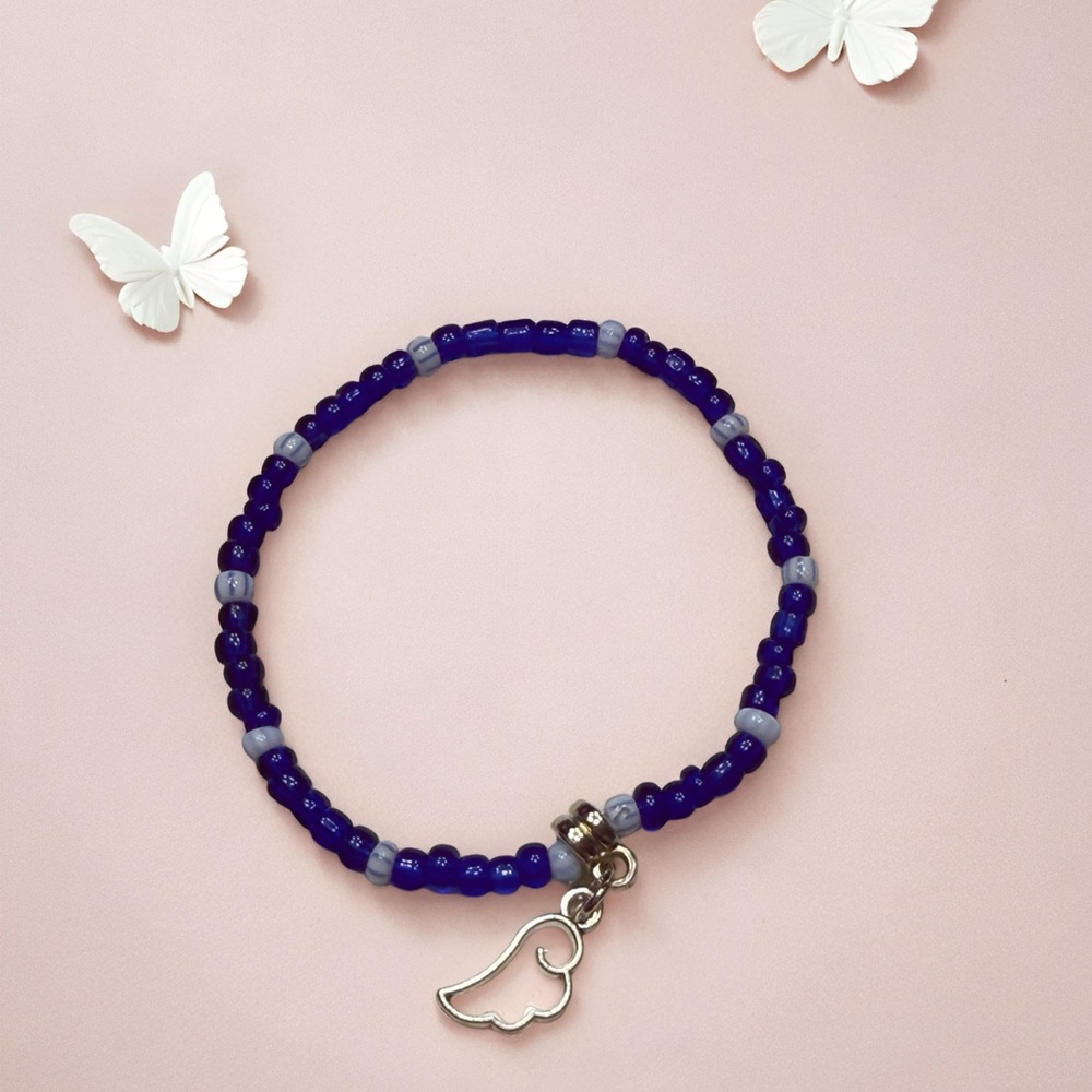 Cobalt Blue Beaded Bracelet with Pink Wing Charm - Picture 5 of 6